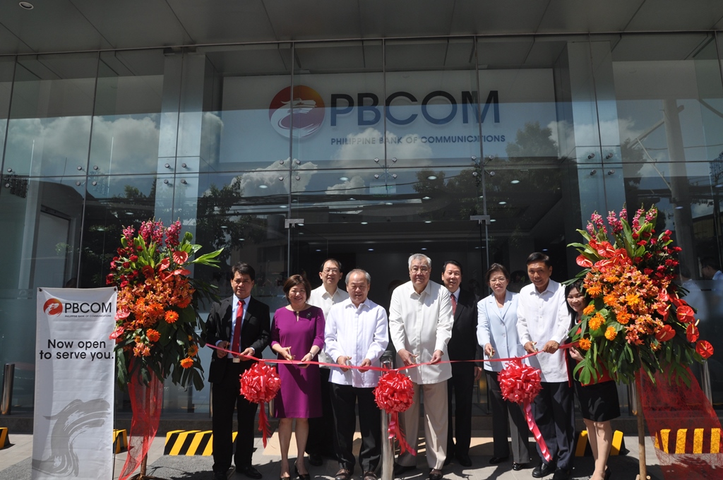 The ribbon cutting ceremony during the PBCOM J.P. Rizal - Makati Branch inauguration was led by (from left): J.P. Rizal - Makati Branch Manager Ariel Santos; President & CEO Patricia May T. Siy; Branch Banking Group Head Victor Lim; Special Guest Philip Chung; Director Roberto Lorayes; Branch Banking Luzon Group Head James Go; Executive Director Carmen Huang; Director Henry Uy; and South Metro Region Head Nida Capistrano.
